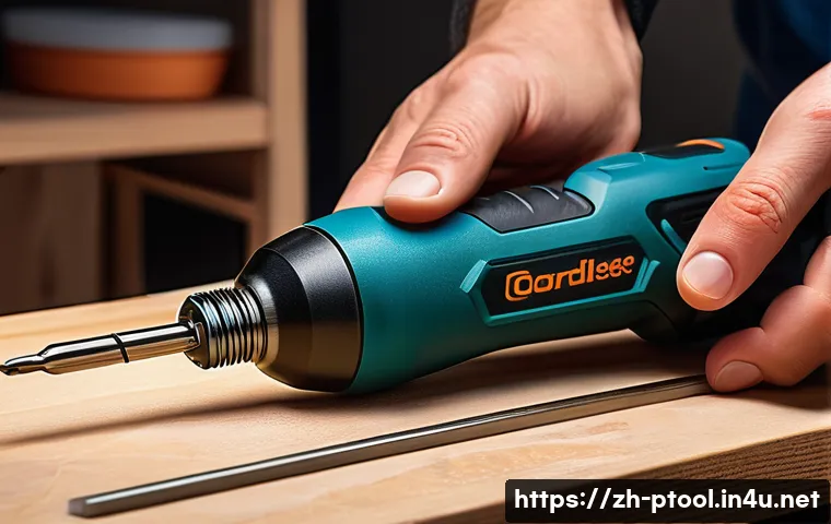 전동 드라이버 가격 비교 - A close-up image of a modern cordless electric screwdriver with a sleek ergonomic grip, featuring a ...