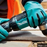 마끼다 전동 공구 사용 후기 - A professional-grade Makita electric drill model XPH12 in use on a construction site, held by a work...